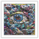 A small framed fibre artwork - needlework - eye - threads - hand stitched