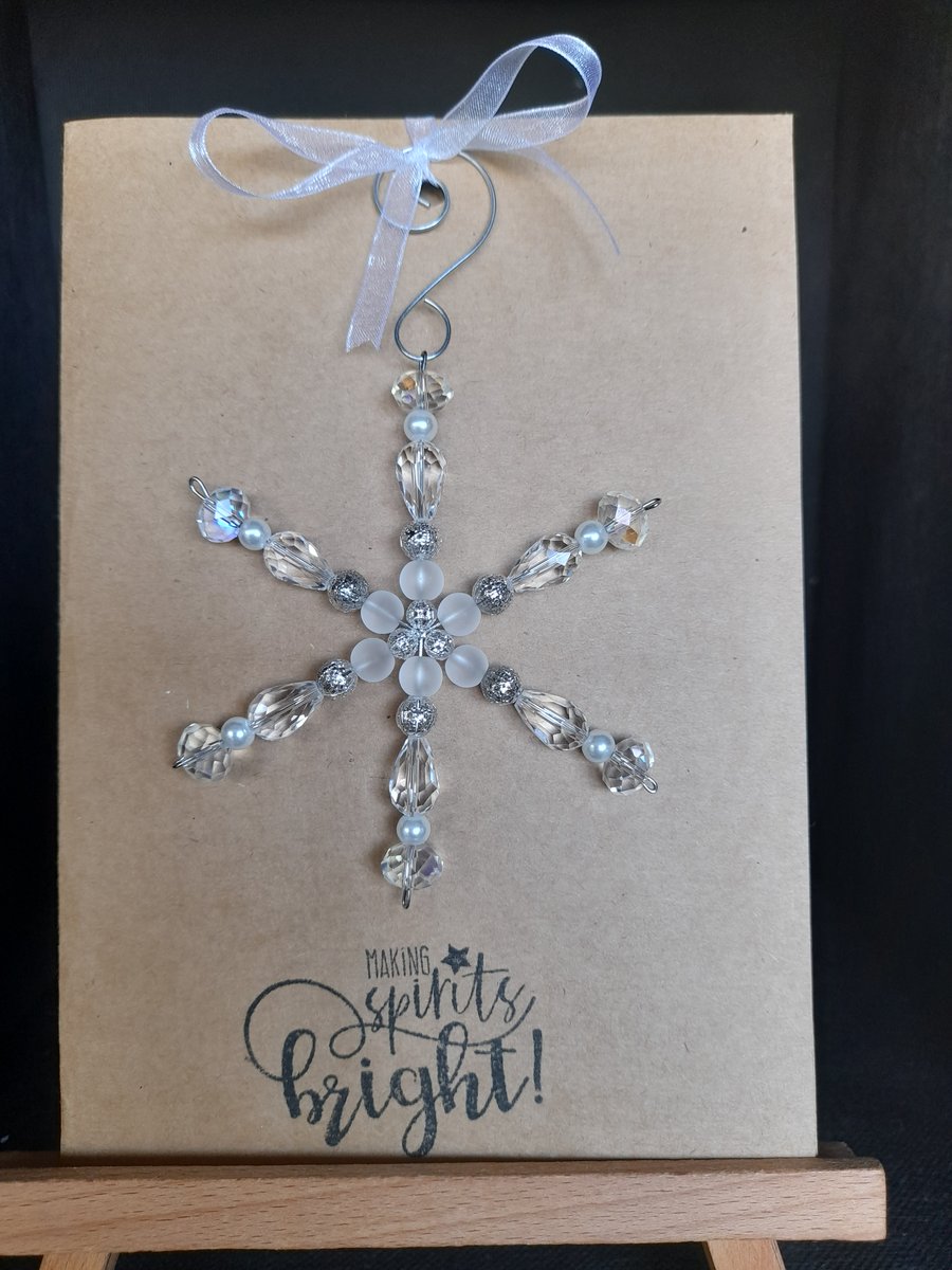 Hand made glass bead star, attached to greetings card