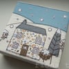 embroidered winter cottage