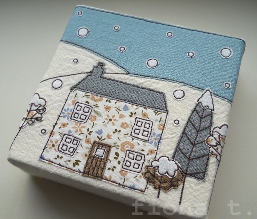 embroidered winter cottage