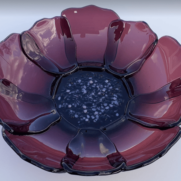 Fused glass flower dish, transparent plum colour