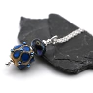 metallic blue dot pendant necklace