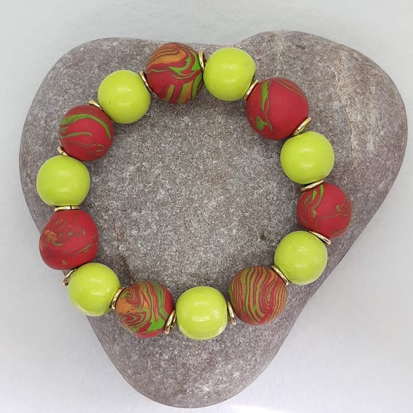 Apple green and poppy red polymer clay bracelet