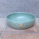 Hand thrown soup bowl in celadon green glaze with heart detail stoneware ceramic