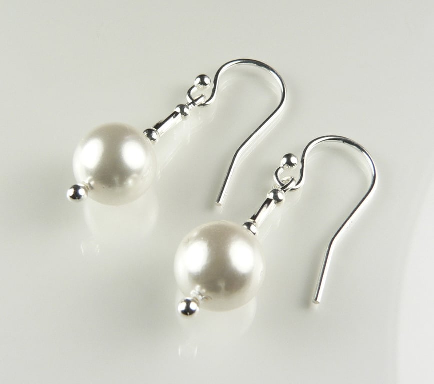 Sterling silver and shell pearl drop earrings with a twist, 8.5-9mm