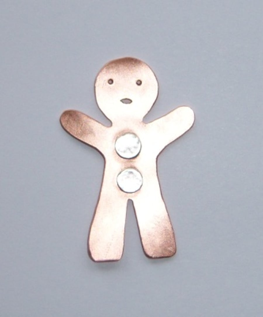 Gingerbread man brooch in copper