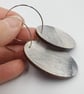 Grey and white hand printed dangle oval shaped earrings  - Image 3