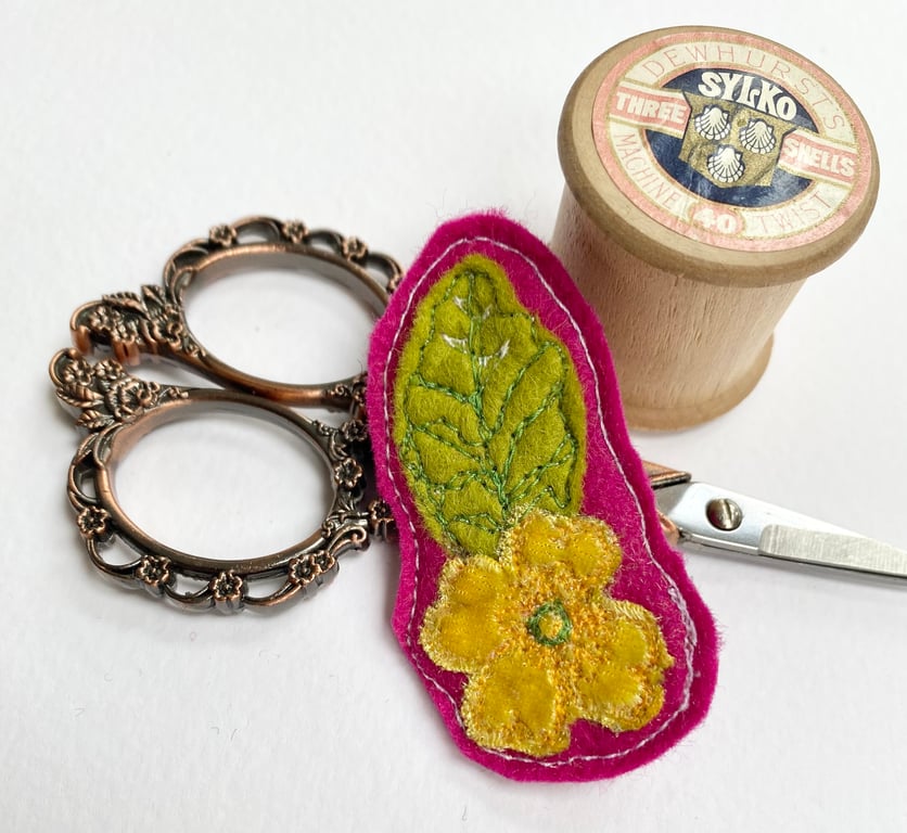 Upcycled yellow flower and leaf brooch pin or badge. 