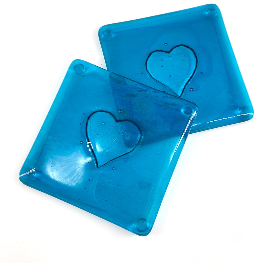 A Gorgeous pair of Teal Fused Glass Coasters with an embossed heart