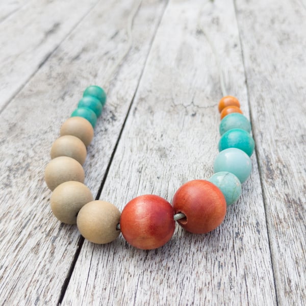Gretel - Upcycled beaded necklace in blue, burnt orange, tan and natural