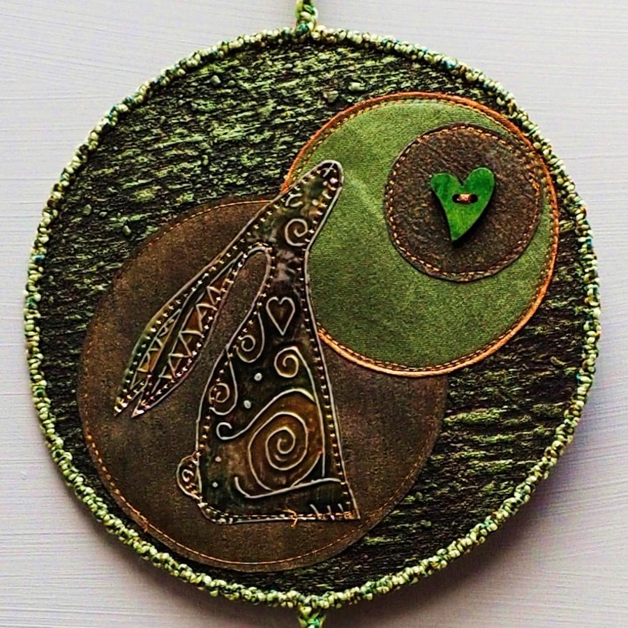 HMVM112 - Hare Moon Gazer Wallhanging- 15cm diameter (90cm long) Green - Black