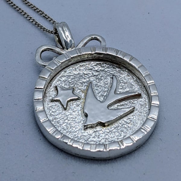 Handmade sterling silver swallow pendant