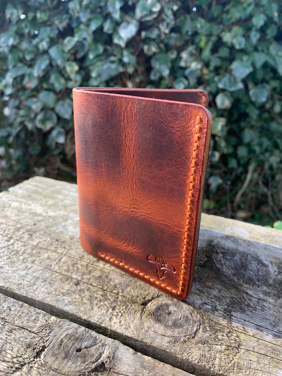 Leather wallet bifold in brown 4 card slots and a cash section