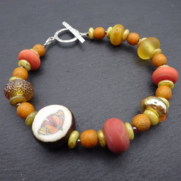 lampwork glass orange bracelet, butterfly jewellery