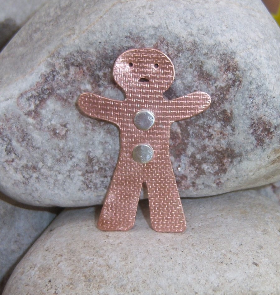 Gingerbreadman brooch in copper