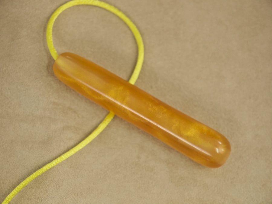 Gold coloured bathroom light pull pendant with cord made in Orkney. lpr35