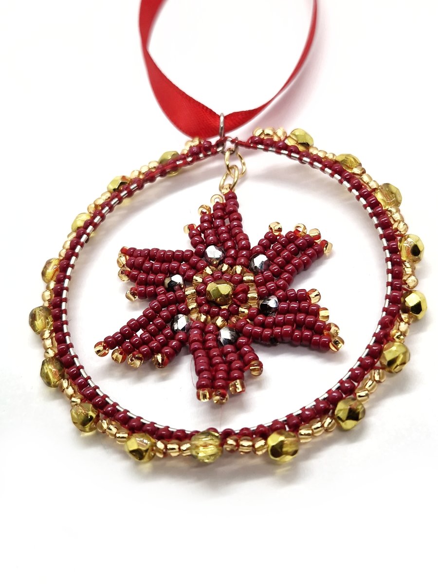 Small red and gold poinsettia star hanging christmas decor