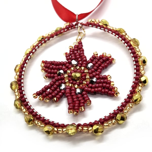 Small red and gold poinsettia star hanging christmas decor
