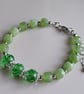 Green peridot and glass crystal beaded bracelet with adjustable chain