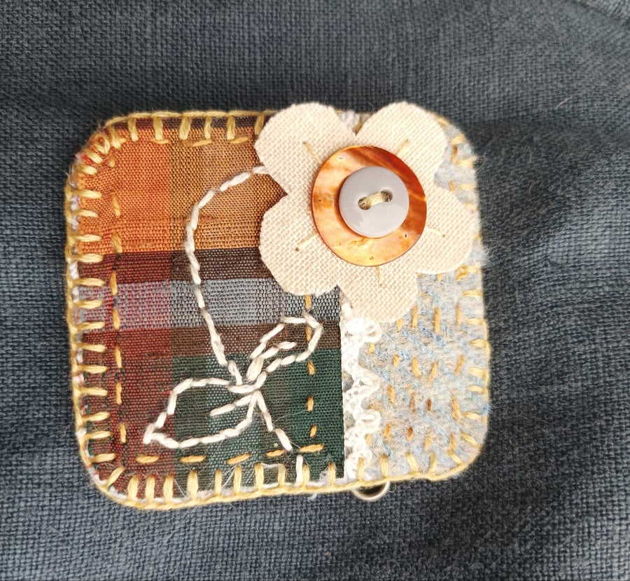 Brooch upcycled and hand stitched flower and tartan 