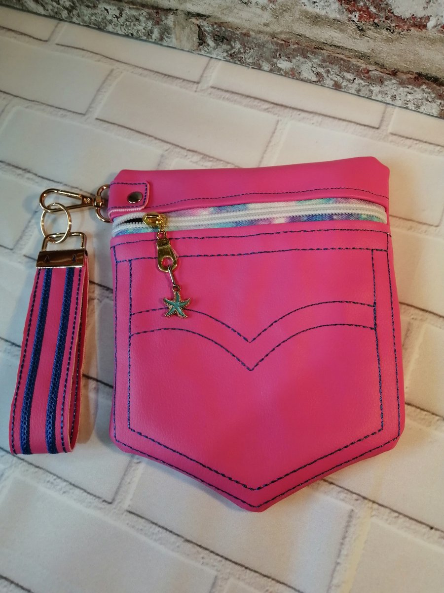VINYL JEANS POCKET STYLE BAG WITH WRISTLET