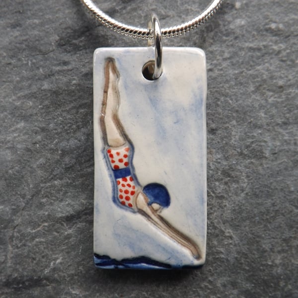 Diving Belle handmade ceramic pendant in red white and blue