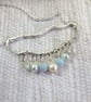 Sterling Silver Rain Cloud Necklace with Blue Gemstone Raindrops - Image 5