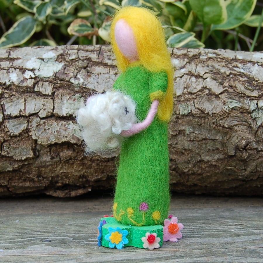 Needle felt figure, Spring holding a lamb - daffodils  on her dress