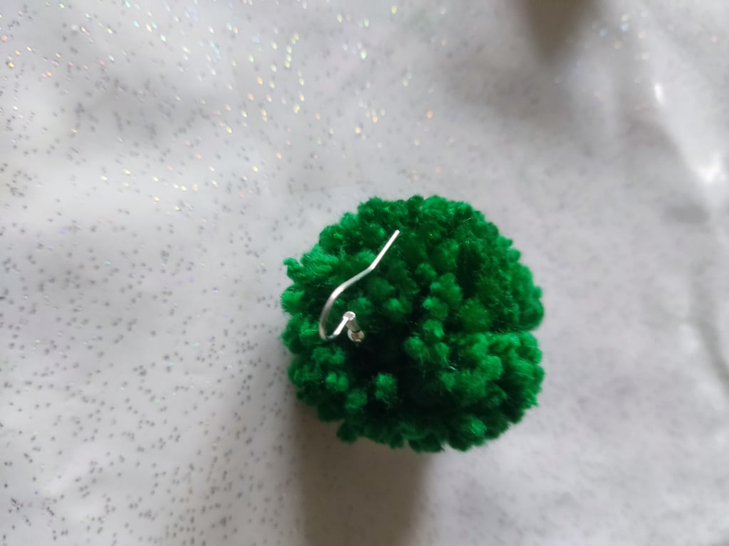 Green pom pom earrings