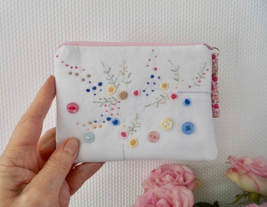 Purse made with reclaimed embroidered vintage linen pink trim.