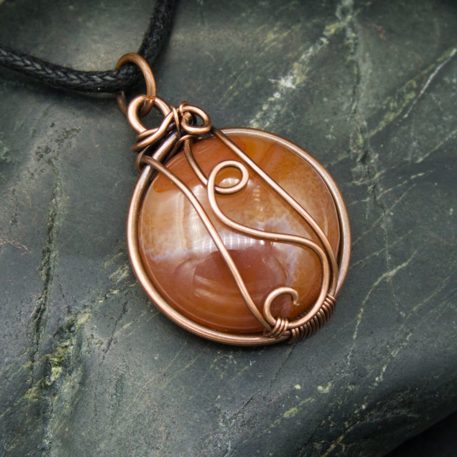SALE - Copper Wire Wrapped Pendant with Circular Peach Orange Coloured Stone