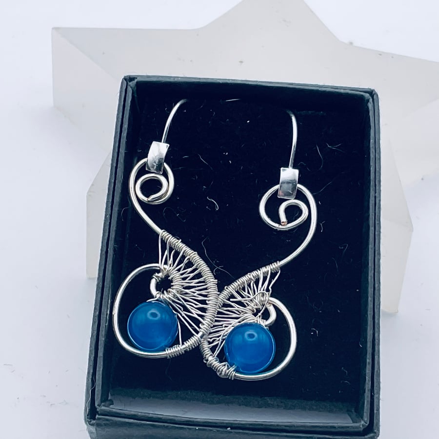 Blue agate dangling wire wrapped earrings, with figure eight weaving