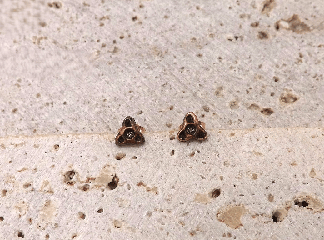 Recycled Small Copper Triquetra Stud Earrings with Clear Cubic Zirconia.