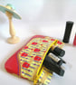  NOVELTY GUITAR FABRIC AND RED FAUX LEATHER BAG - Image 1