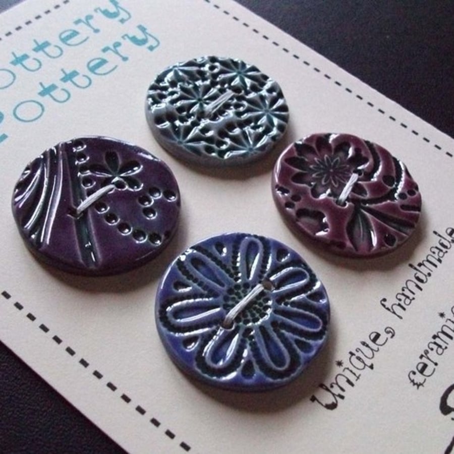 set of four large ceramic buttons