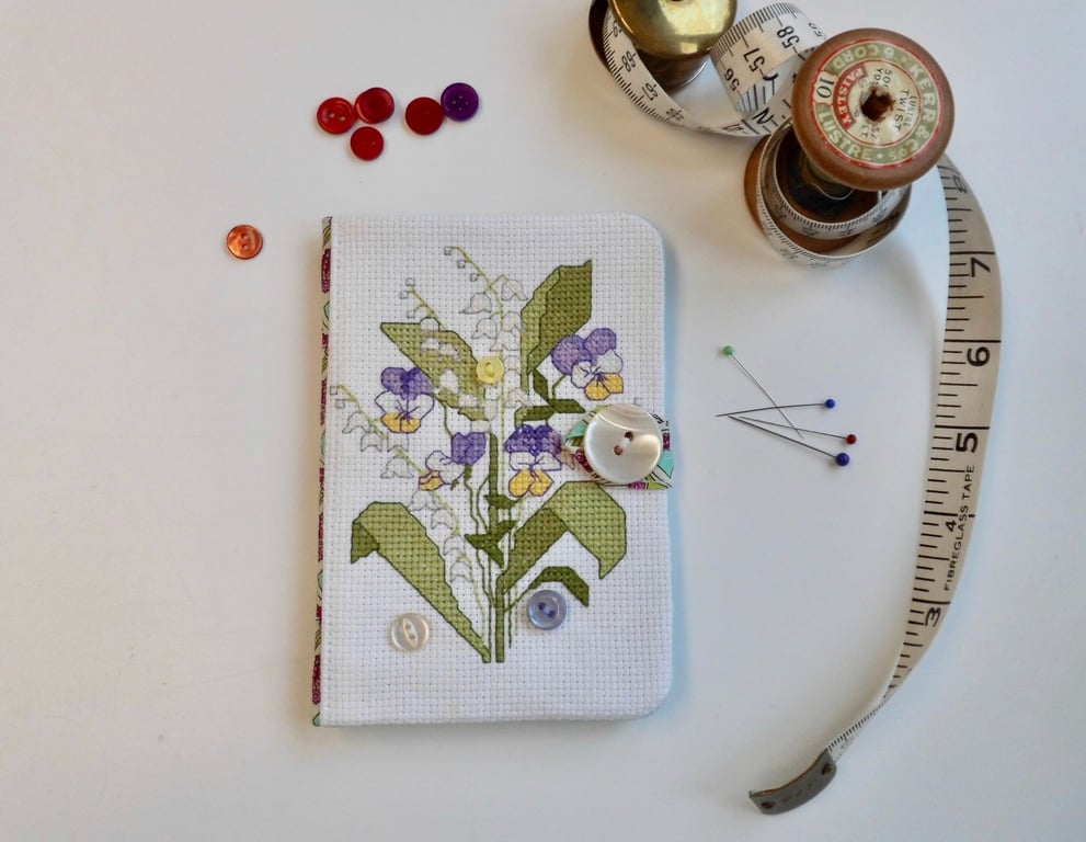 Sewing needle case with reclaimed cross stitch and Liberty fabric.