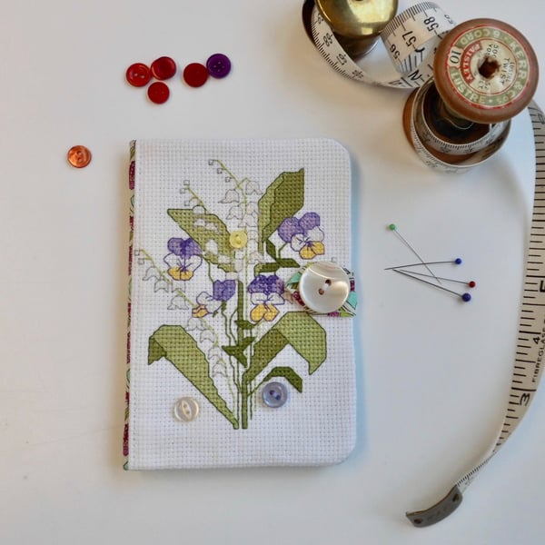 Sewing needle case with reclaimed cross stitch and Liberty fabric.