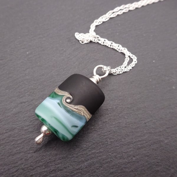 lampwork glass pendant necklace, black and green sterling silver jewellery