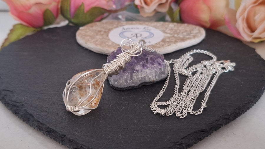 Ornate wirewrapped Topaz Pendant on a long silver plated chain