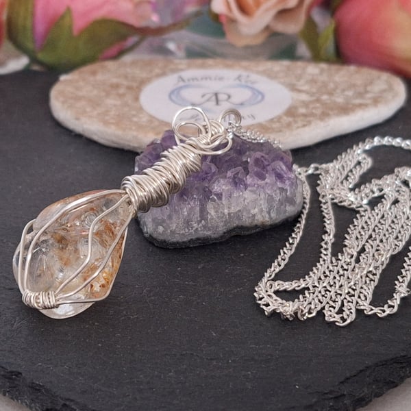 Ornate wirewrapped Topaz Pendant on a long silver plated chain