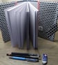 A5 sketchbook or notebook with fabric cover, fighter kokeshi doll design - Image 4