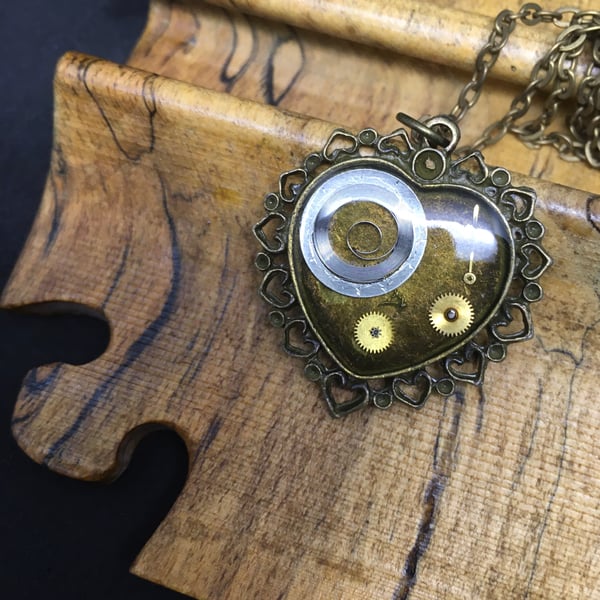Steampunk resin-set heart pendant