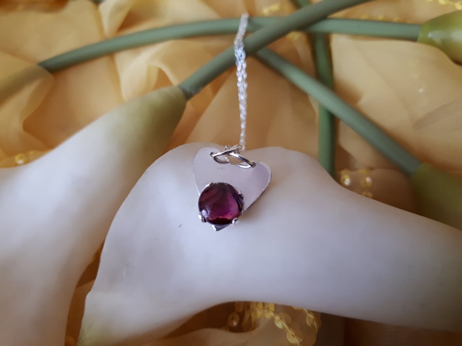 Sterling silver heart necklace set with purple abalone shell