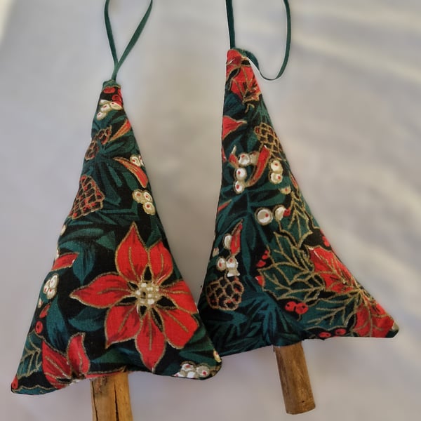 Pair of hand crafted fabric christmas tree decorations with cinnamon trunk