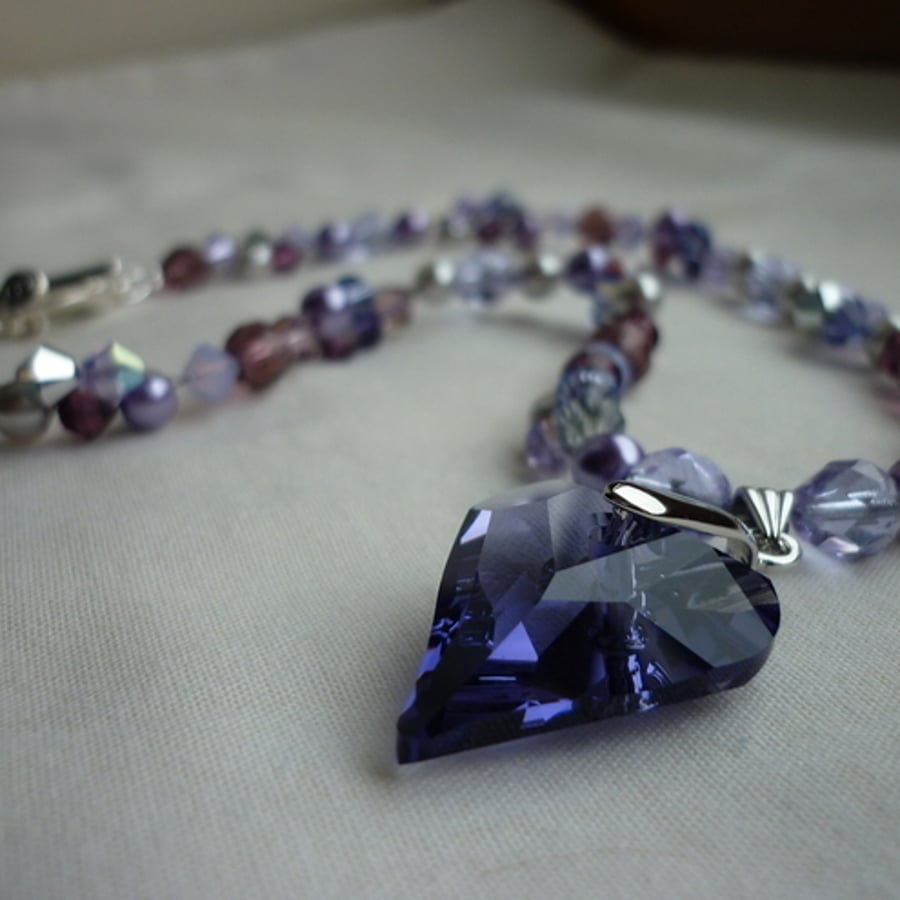   TANZANITE SWAROVSKI CRYSTAL HEART NECKLACE.  264