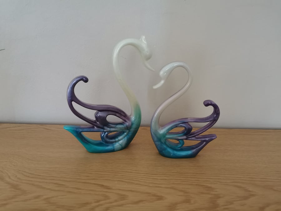 Pair of resin handmade swans