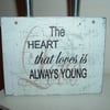 Shabby chic distressed plaque-THE HEART THAT LOVES
