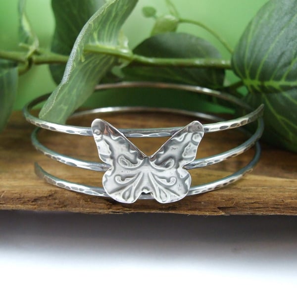 Sterling Silver Wide Open Spiral Bangle with Butterfly. 