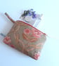 Make up or toiletries bag in an autumnal designer remnant.