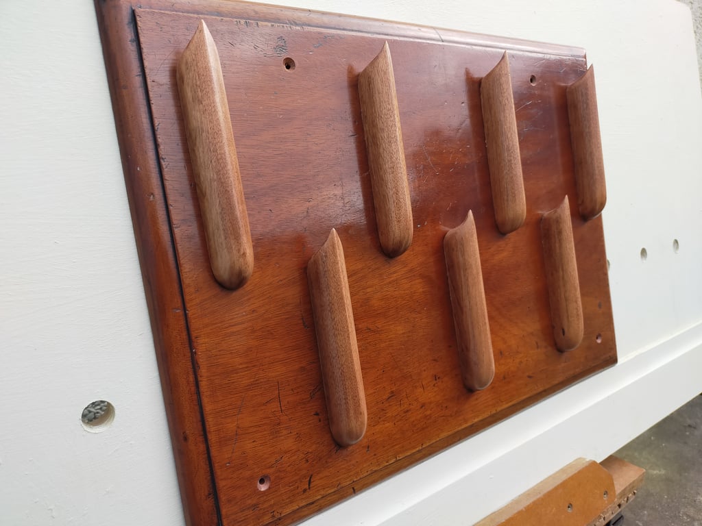 Unique "organ pipe" coat rack.
